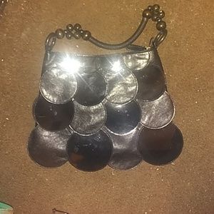 A genine lether and patent leather purse